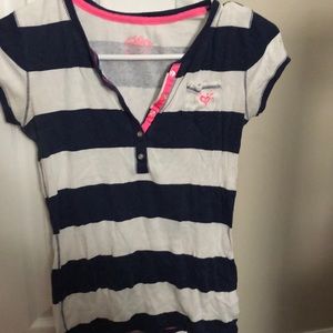 Navy blue and white polo with accents of pink